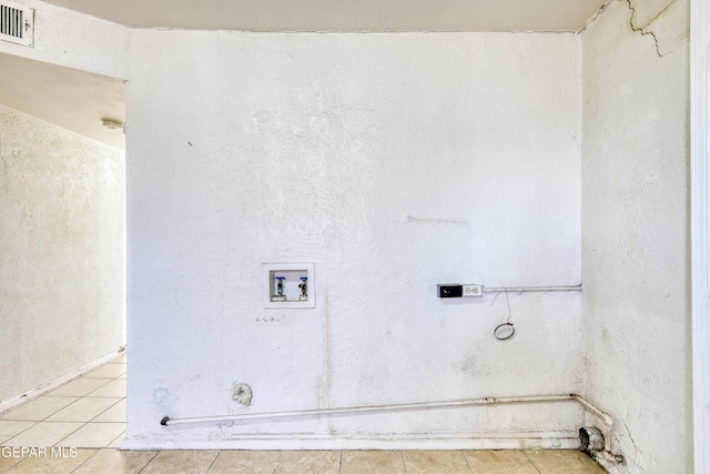 159 Silvas Way, El Paso, TX 79907 - laundry area featuring tile patterned flooring and washer hookup