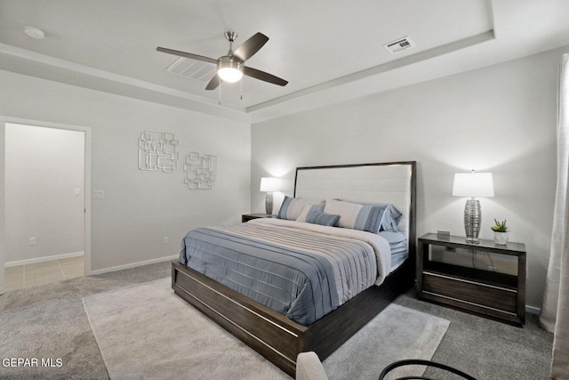 13925 Lorenz Ave, El Paso, TX 79928 - bedroom featuring a tray ceiling, carpet floors, baseboards, and a ceiling fan