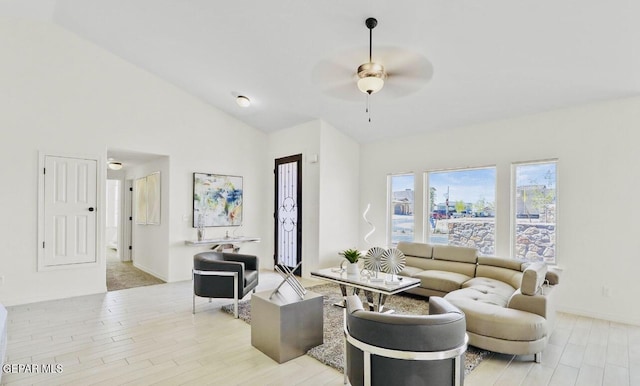 556 Cedarwood Ave, El Paso, TX 79928 - living room featuring a ceiling fan, light wood finished floors, lofted ceiling, and baseboards