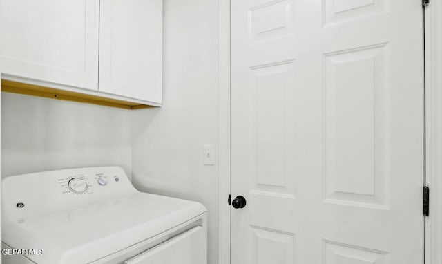 556 Cedarwood Ave, El Paso, TX 79928 - clothes washing area with washer / clothes dryer and cabinet space