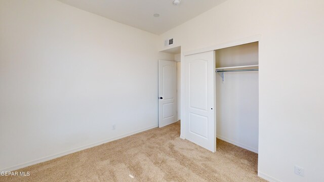 556 Cedarwood Ave, El Paso, TX 79928 - unfurnished bedroom with carpet floors, a closet, and baseboards