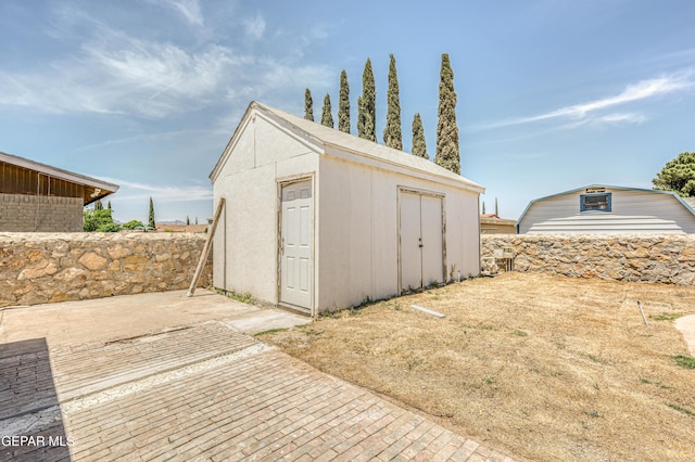 1957 Ratner Cir, El Paso, TX 79936 - garage with a storage unit