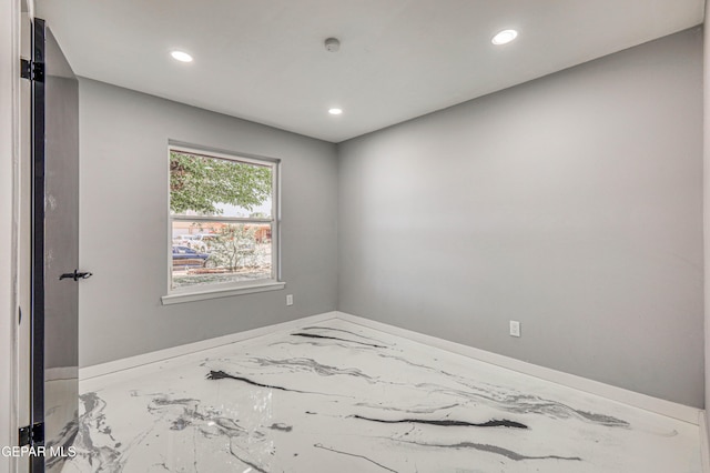 1957 Ratner Cir, El Paso, TX 79936 - unfurnished room with recessed lighting, marble finish floors, baseboards, and a smoke detector