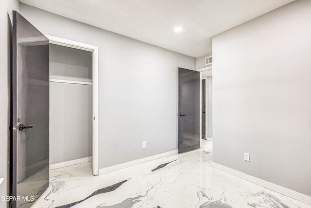 1957 Ratner Cir, El Paso, TX 79936 - unfurnished bedroom with recessed lighting, baseboards, marble finish flooring, and a closet