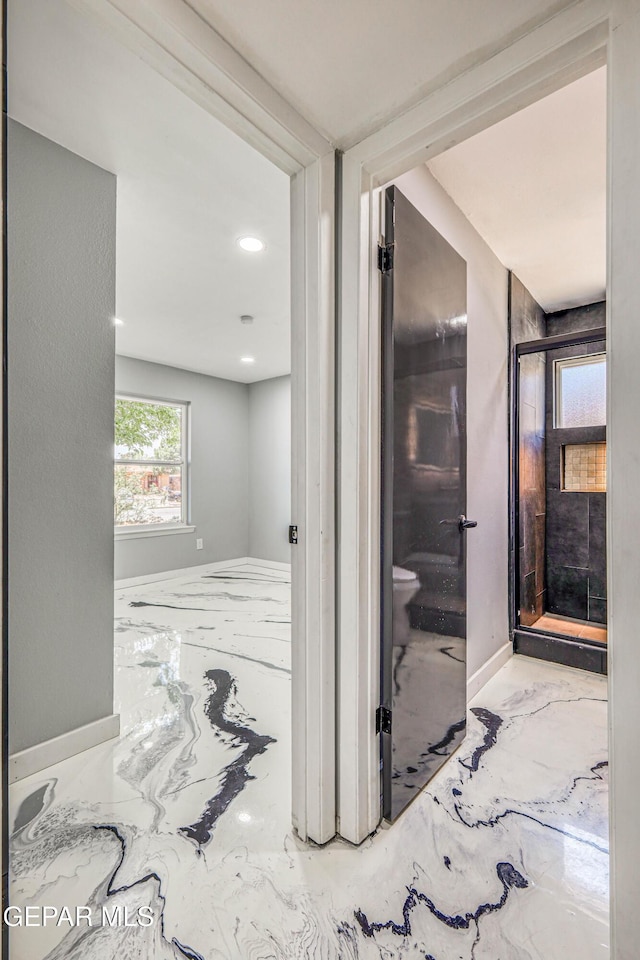 1957 Ratner Cir, El Paso, TX 79936 - hall featuring marble finish floors, recessed lighting, and baseboards