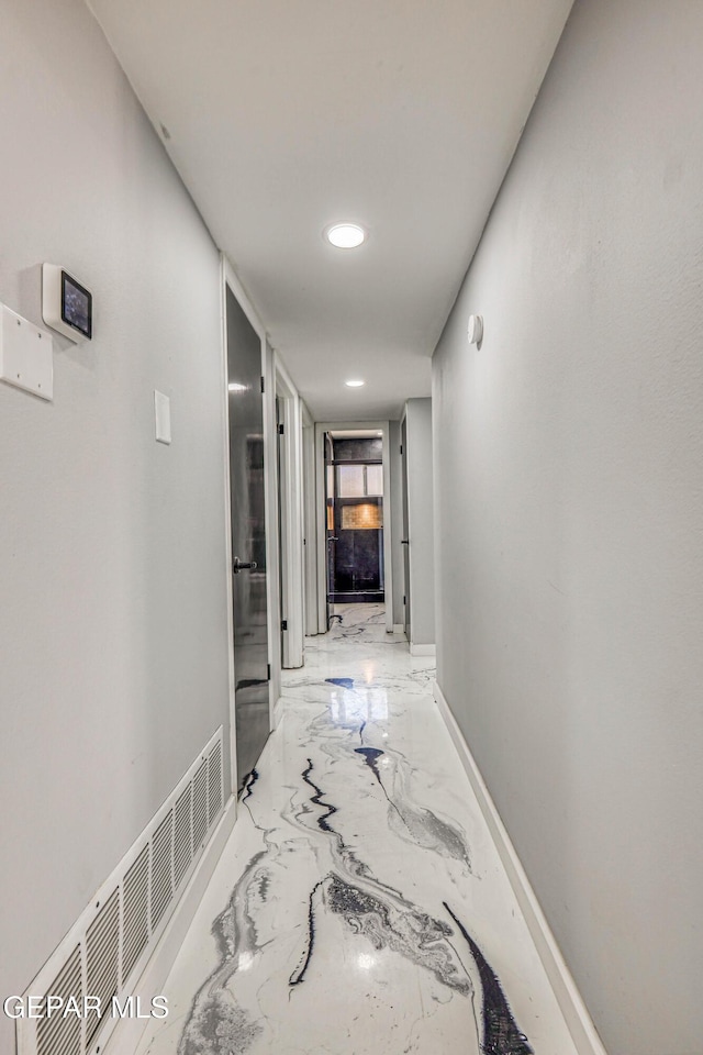 1957 Ratner Cir, El Paso, TX 79936 - hall with marble tiled floors, recessed lighting, and baseboards