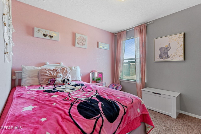 513 Bogota Pl, El Paso, TX 79928 - bedroom featuring carpet flooring, a textured ceiling, and baseboards