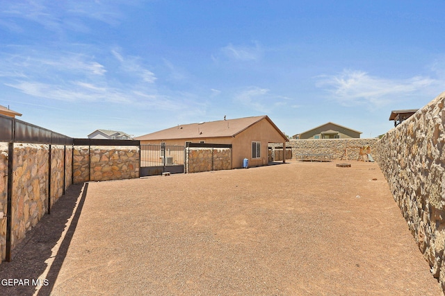 513 Bogota Pl, El Paso, TX 79928 - fenced yard featuring a gate