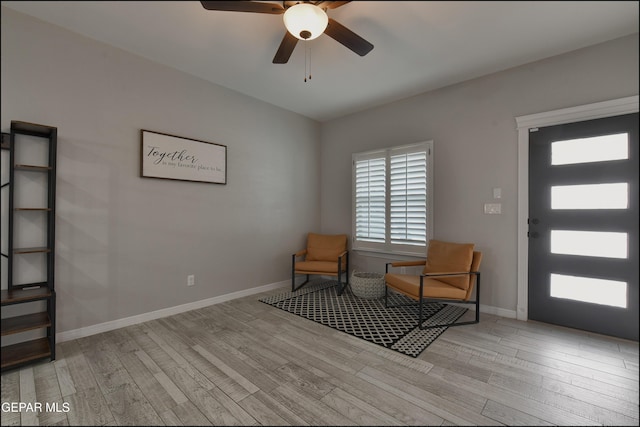 937 Grandevole Dr, El Paso, TX 79932 - living area with wood finished floors, a ceiling fan, and baseboards