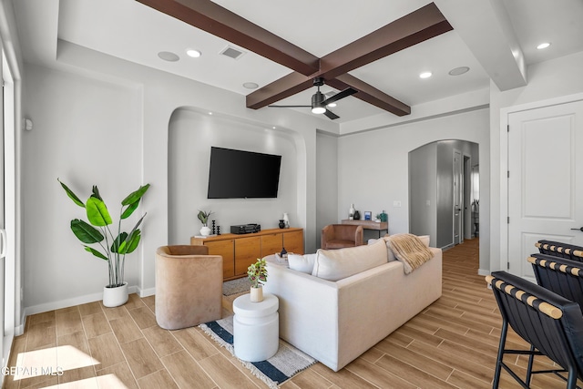 3817 Aspire Pl, El Paso, TX 79938 - living room featuring arched walkways, wood tiled floors, a ceiling fan, beam ceiling, and coffered ceiling