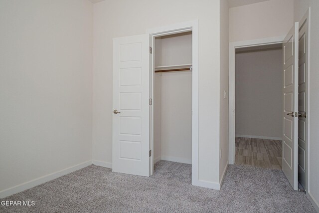 2240 Tierra Delmonte Dr, El Paso, TX 79938 - unfurnished bedroom featuring carpet floors, a closet, and baseboards