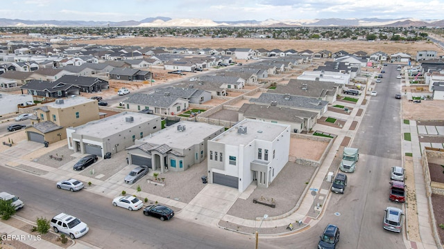 3516 Essence St, El Paso, TX 79938 - aerial view of residential area featuring a mountainous background