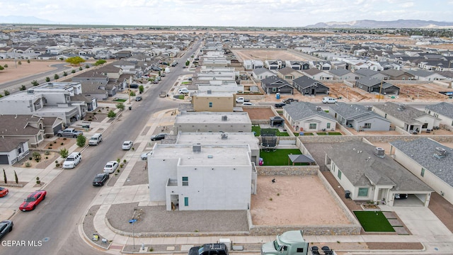 3516 Essence St, El Paso, TX 79938 - aerial perspective of suburban area with a mountain backdrop