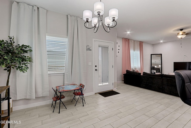 3516 Essence St, El Paso, TX 79938 - entrance foyer with a chandelier, baseboards, and recessed lighting