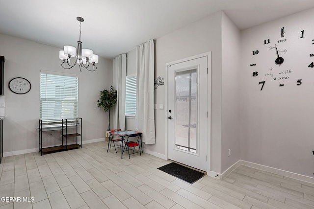 3516 Essence St, El Paso, TX 79938 - foyer featuring a chandelier and baseboards
