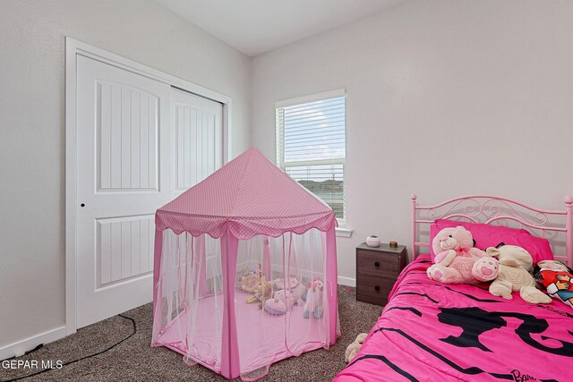 3516 Essence St, El Paso, TX 79938 - carpeted bedroom with baseboards and a closet
