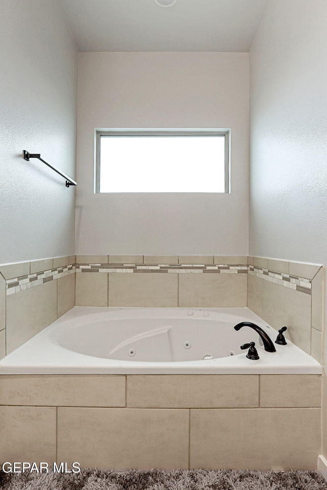 3516 Essence St, El Paso, TX 79938 - full bathroom with a jetted tub