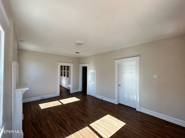 3416 Rivera Ave, El Paso, TX 79905 - empty room featuring baseboards and wood finished floors