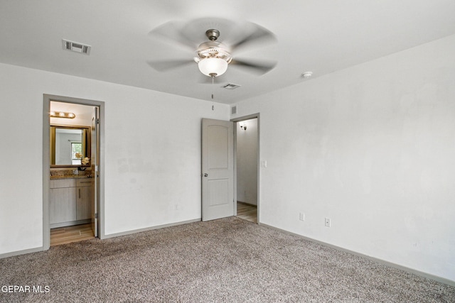 525 Cedarwood Dr, El Paso, TX 79928 - unfurnished bedroom with light carpet, baseboards, and a ceiling fan