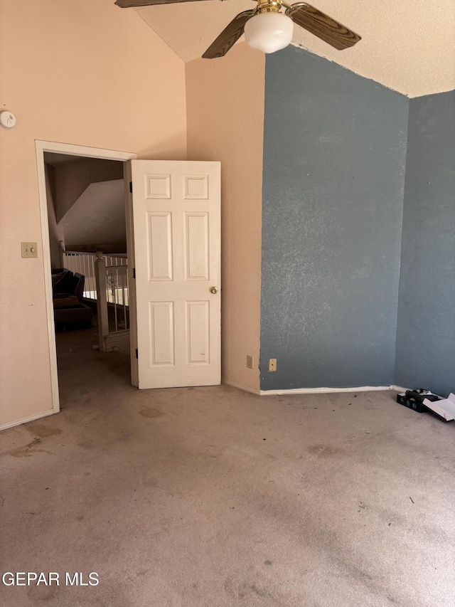 10645 Obsidian St, El Paso, TX 79924 - unfurnished room with carpet, a ceiling fan, vaulted ceiling, and baseboards
