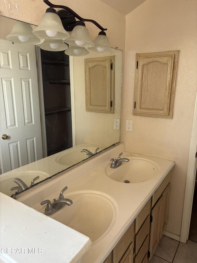 10645 Obsidian St, El Paso, TX 79924 - bathroom with tile patterned floors and double vanity