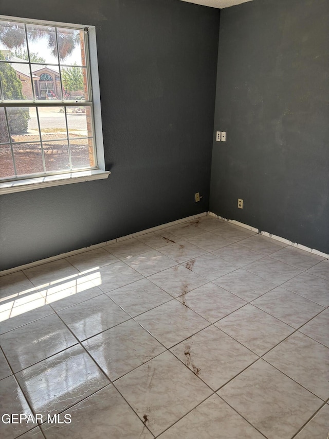 10645 Obsidian St, El Paso, TX 79924 - spare room featuring baseboards