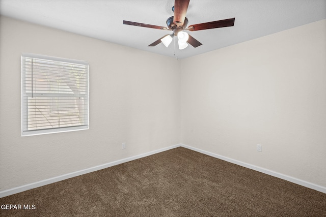5325 Timberwolf Dr, El Paso, TX 79903 - unfurnished room featuring dark carpet, a ceiling fan, and baseboards