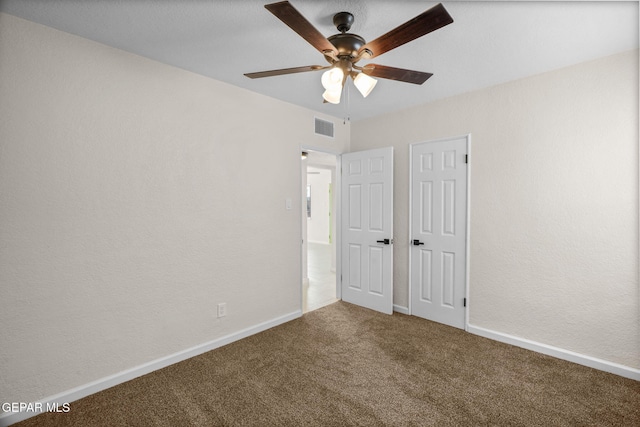 5325 Timberwolf Dr, El Paso, TX 79903 - unfurnished bedroom with carpet, baseboards, and a ceiling fan