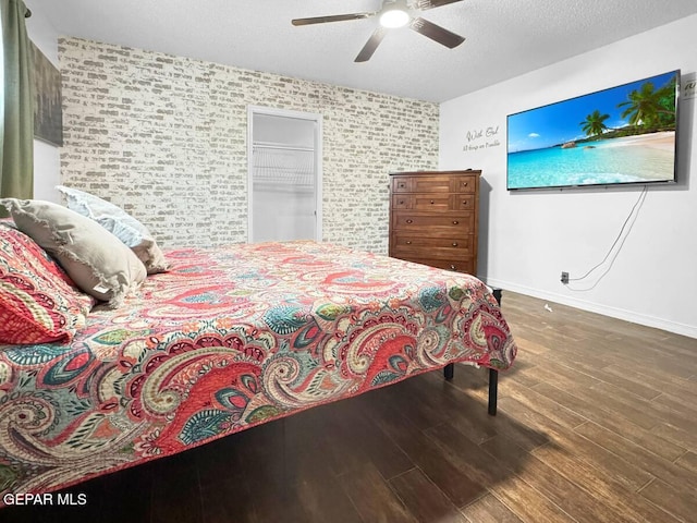 1523 Vista Real Dr, El Paso, TX 79935 - bedroom with wood finished floors, baseboards, and a ceiling fan