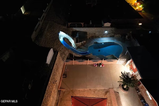 1523 Vista Real Dr, El Paso, TX 79935 - view of pool at twilight