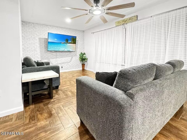 1523 Vista Real Dr, El Paso, TX 79935 - living area featuring baseboards and a ceiling fan