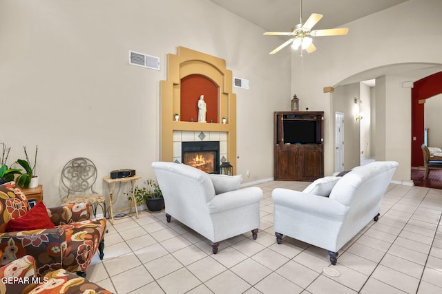 421 Wild Willow Dr, El Paso, TX 79922 - living room with arched walkways, high vaulted ceiling, ceiling fan, and light tile patterned floors