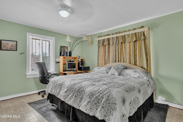 8715 Lawson St, El Paso, TX 79904 - bedroom featuring baseboards and ceiling fan