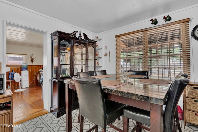 8715 Lawson St, El Paso, TX 79904 - dining room featuring a wainscoted wall and ornamental molding