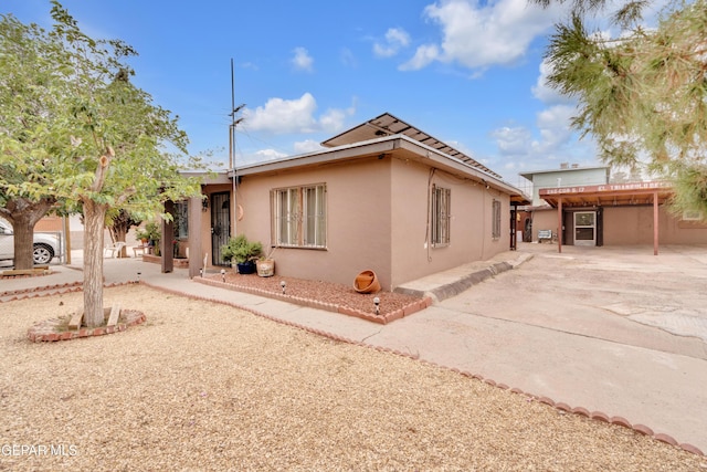 8715 Lawson St, El Paso, TX 79904 - ranch-style house featuring stucco siding and concrete driveway
