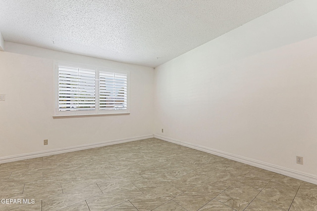 4540 Swan Dr, El Paso, TX 79922 - unfurnished room with a textured ceiling and baseboards