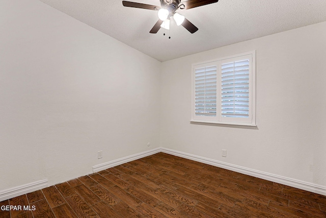 4540 Swan Dr, El Paso, TX 79922 - unfurnished room with dark wood-style floors, a ceiling fan, and baseboards
