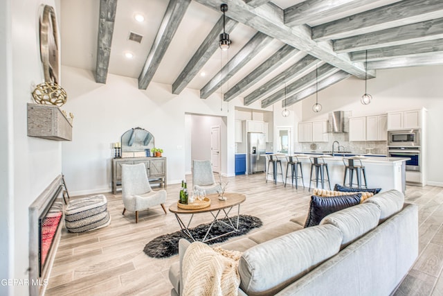 309 Blue Vly, El Paso, TX 79928 - living area featuring baseboards, light wood-type flooring, and recessed lighting