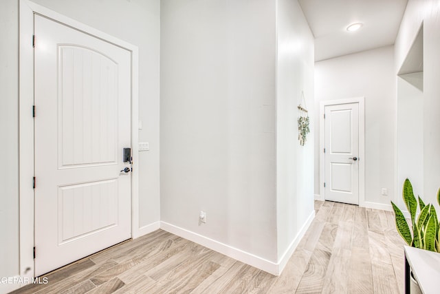309 Blue Vly, El Paso, TX 79928 - foyer with light wood finished floors and baseboards