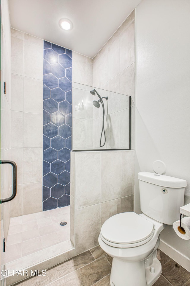 309 Blue Vly, El Paso, TX 79928 - full bathroom with a shower stall, toilet, and recessed lighting