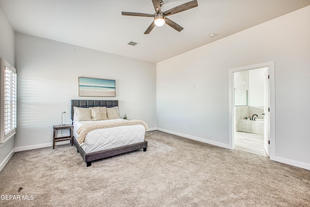 309 Blue Vly, El Paso, TX 79928 - bedroom featuring carpet, baseboards, and connected bathroom