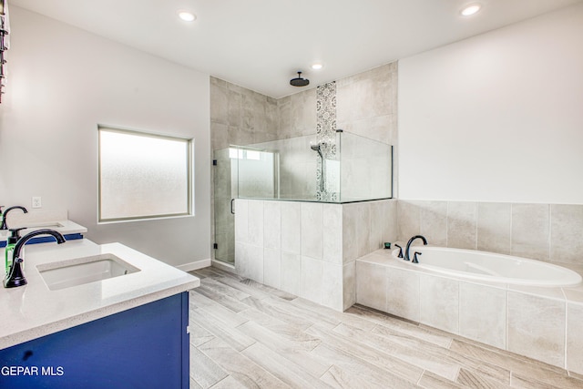 309 Blue Vly, El Paso, TX 79928 - full bathroom featuring a stall shower, a bath, recessed lighting, and vanity