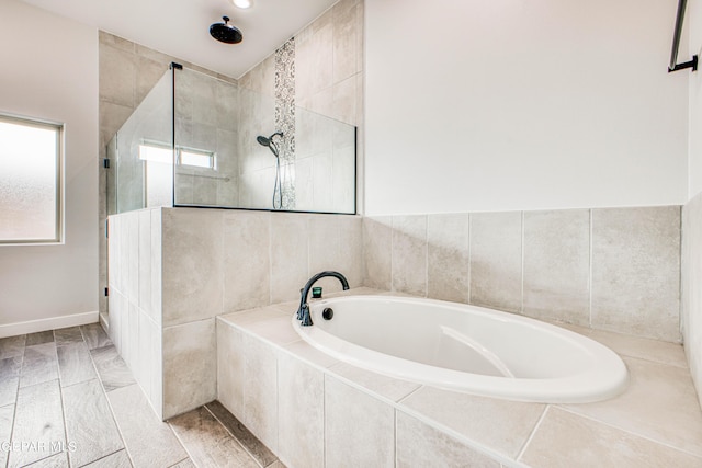 309 Blue Vly, El Paso, TX 79928 - full bath with tiled shower, a garden tub, and baseboards