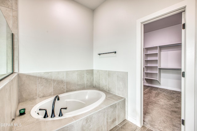 309 Blue Vly, El Paso, TX 79928 - full bathroom featuring a garden tub and baseboards