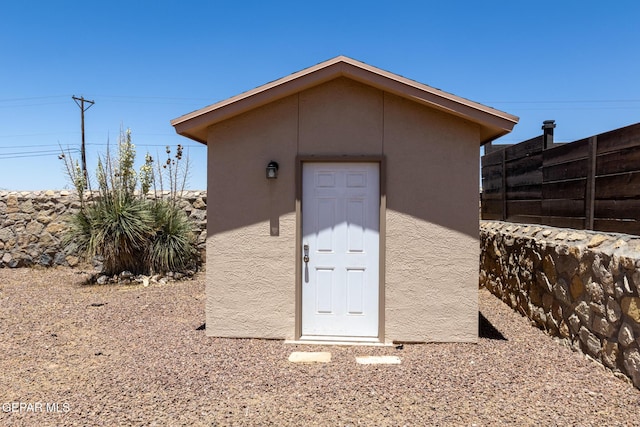 10793 Blue Sage Cir, El Paso, TX 79924 - view of shed featuring fence