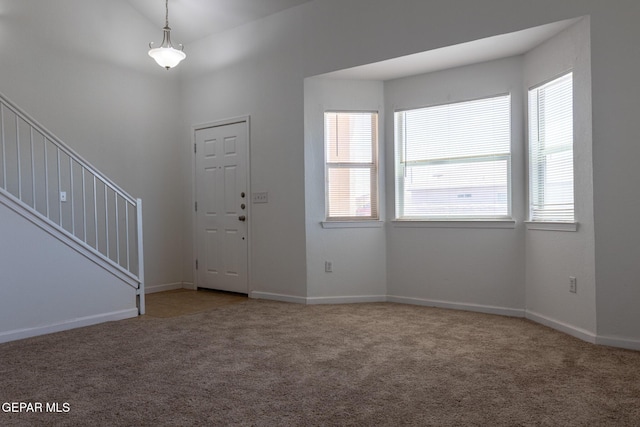 10793 Blue Sage Cir, El Paso, TX 79924 - entrance foyer with carpet flooring, stairs, and baseboards
