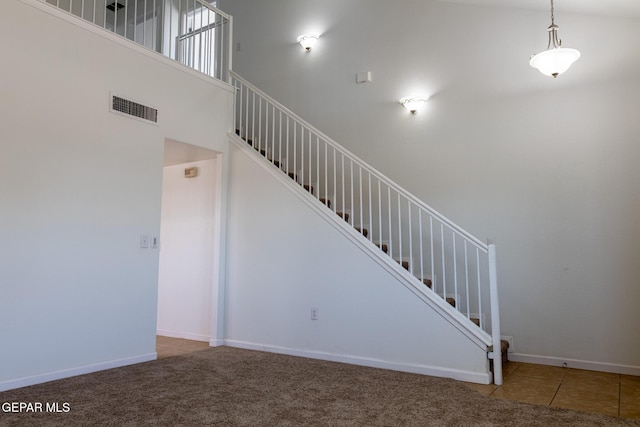 10793 Blue Sage Cir, El Paso, TX 79924 - stairway featuring carpet floors and baseboards