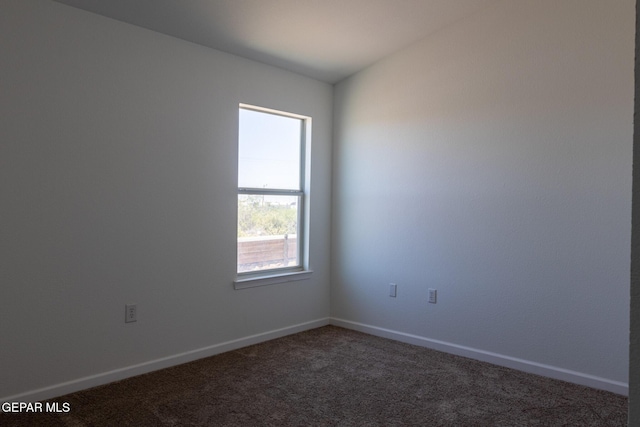 10793 Blue Sage Cir, El Paso, TX 79924 - unfurnished room featuring dark carpet and baseboards