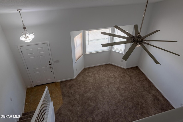 10793 Blue Sage Cir, El Paso, TX 79924 - tiled foyer entrance featuring a ceiling fan, baseboards, and carpet flooring