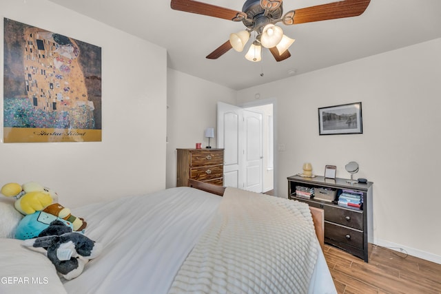 3208 Cascade Point Dr, El Paso, TX 79938 - bedroom with wood finished floors, baseboards, and a ceiling fan